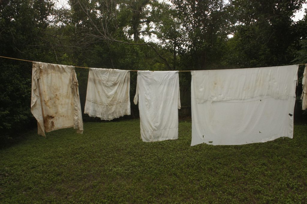 Clothing and fabric lé. Givens found while in Texas appear in all chapters of the project, 2015. Photo courtesy of the artist.