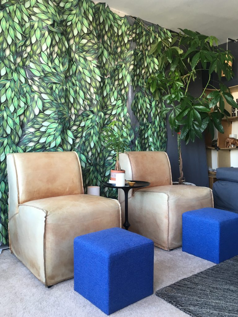 Image of Denenge's studio with Osanyin-inspired leaf wallpaper installation. Image courtesy of D. Denenge Duyst-Akpem.