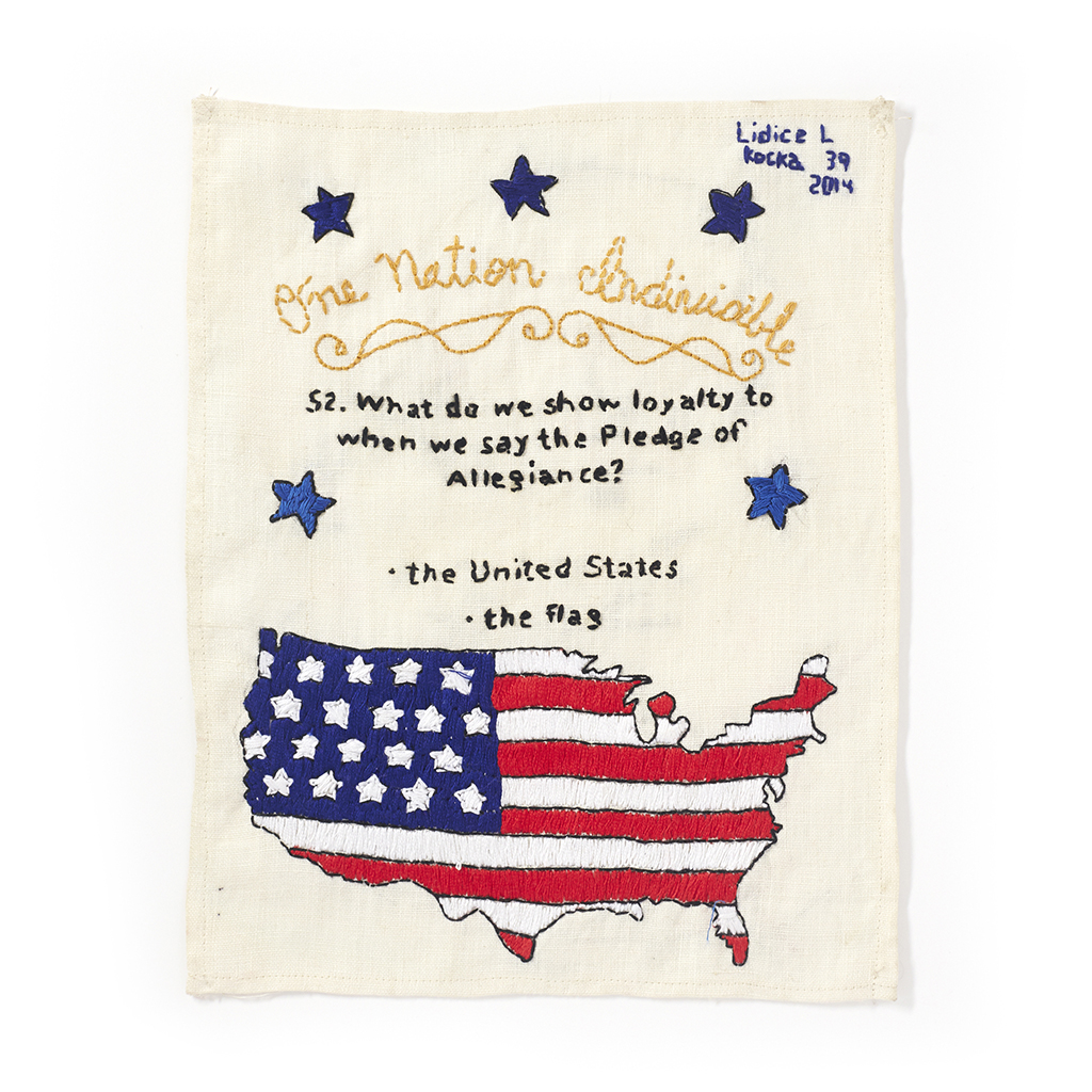 “US Citizenship Test Sampler” #52 Made by Lidice L., 2013–present. Embroidered sampler with the question and answer: “52. What do we show loyalty to when we say the Pledge of Alligence? The United States, the flag” stitched alongside the flag in the shape of the map of the U.S. Photo by Jayson Cheung.