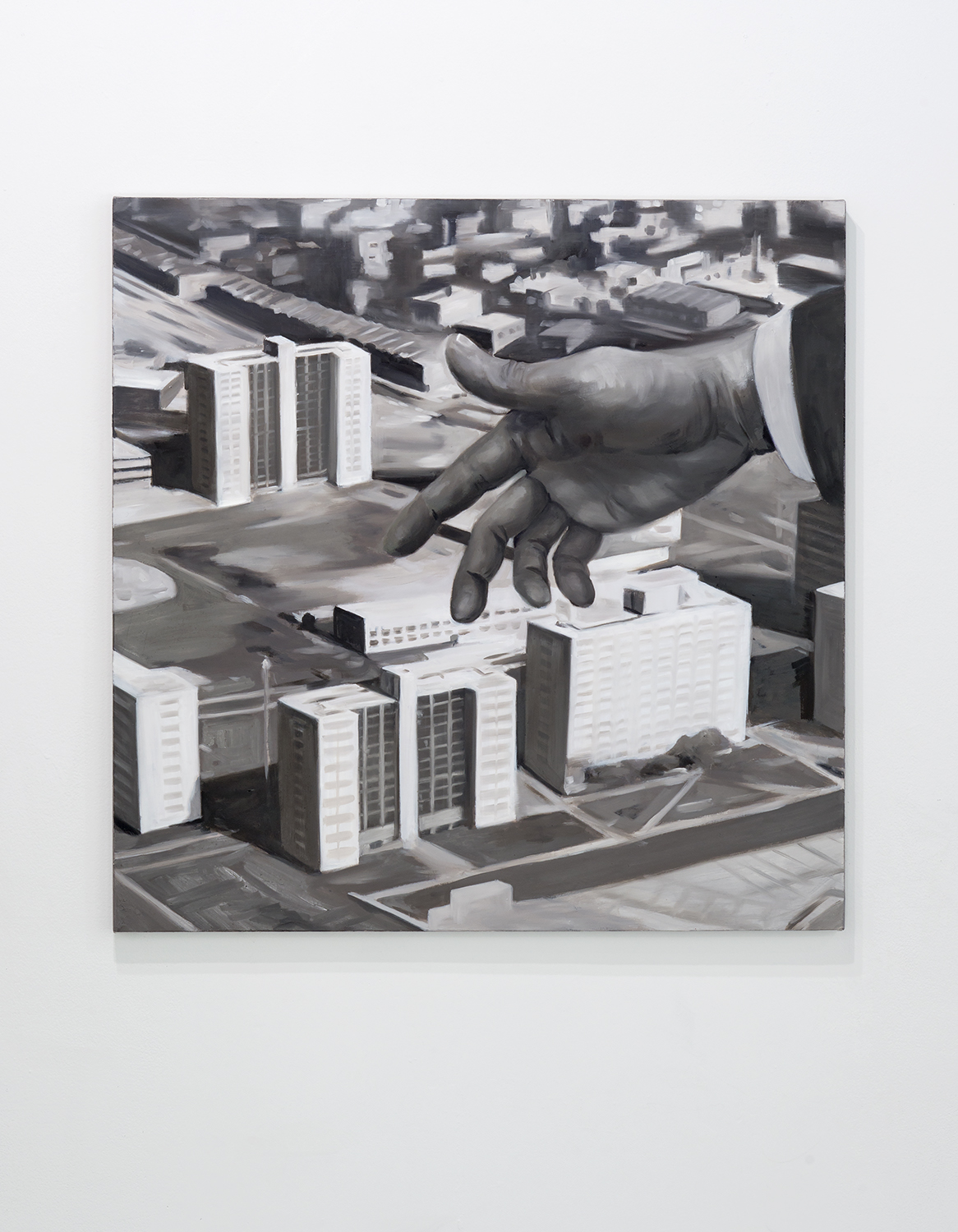 New City by Haerim Lee. Black and White painting that shows a hand gesturing over a model of the city of Chicago. Image courtesy of Greg Ruffing. 