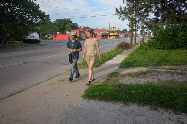 Image: Astrid Kaemmerling shown walking Enos Park while being led by a participant of the Enos Park Walking Laboratory. Location: Enos Park, IL. Photo by Grace Katalinich.