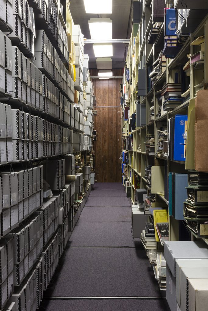 Image: Wernher von Braun Archive, U.S. Space and Rocket Center, Huntsville, AL, 2019 by Barbara Diener. A view of an isle of boxes and files in the Wernher von Braun Archive. Image courtesy of the artist.