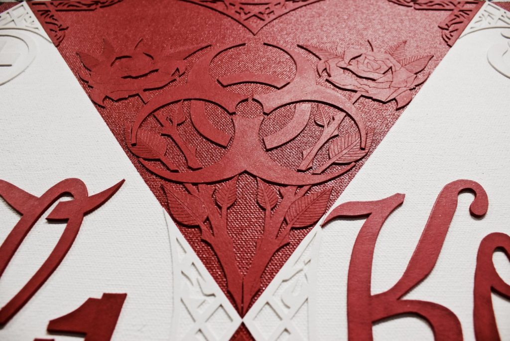 Image: Detail of “Classic Koca Cola Can” by Kristoffer McAfee, showing hand-cut illustration board overlays. Image courtesy of the artist.