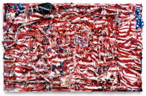 Image: Don't Matter How Raggly the Flag, It Still Got to Tie Us Together by Thornton Dial. A large, mixed-media piece that looks like a tattered American Flag. © Estate of Thornton Dial. Photo: Stephen Pitkin/Pitkin Studio/
