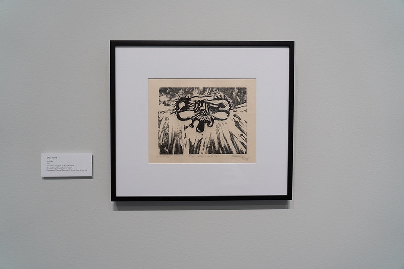 Image: Erick Minnis, Untitled, 2021. The image shows a framed one-color woodcut of an abstract image printed in black on Fuji Okawara paper, a piece printed by Normal Editions of Illinois State University. Photo by Jessica Bingham. Courtesy of University Galleries of Illinois State University.