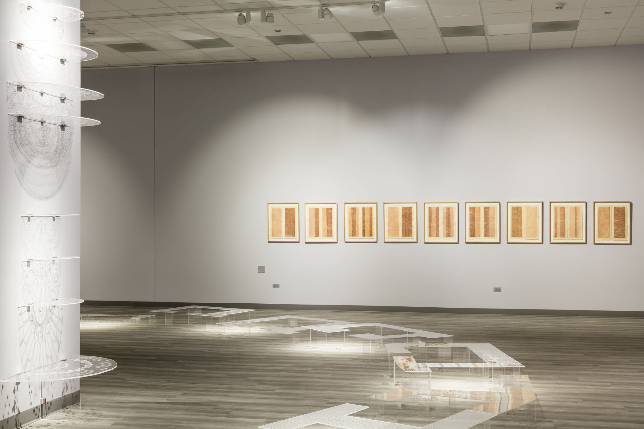 Six wooden frames are each filled with pieces of broken clay in different configurations; the voids have equal visual importance and presence. Gunjan Kumar, Broken Whole, 2021. Clay. Photo Credit: Jonathan Castillo, Courtesy of South Asia Institute.