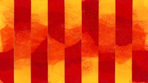 An abstract image made from red, orange, and yellow tissue papers fading into each other in a vertical striped pattern.