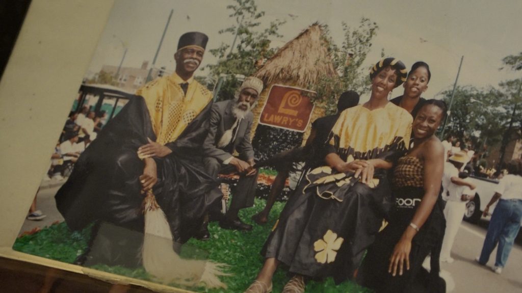 Image: Blackburn at the Bud Billiken Parade with Dance Africa (1980s). Photo of image by Wills Glasspiegel.