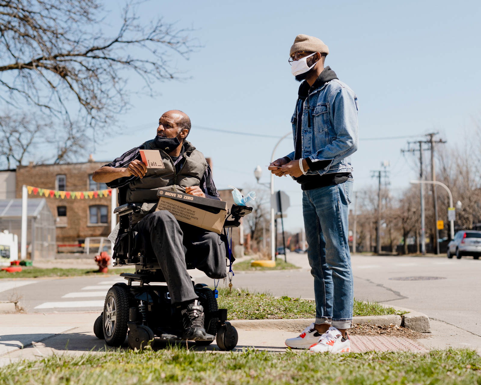 Jordan Campbell taking a moment to catch up with a Southside neighbor. Photo by Lyndon French.