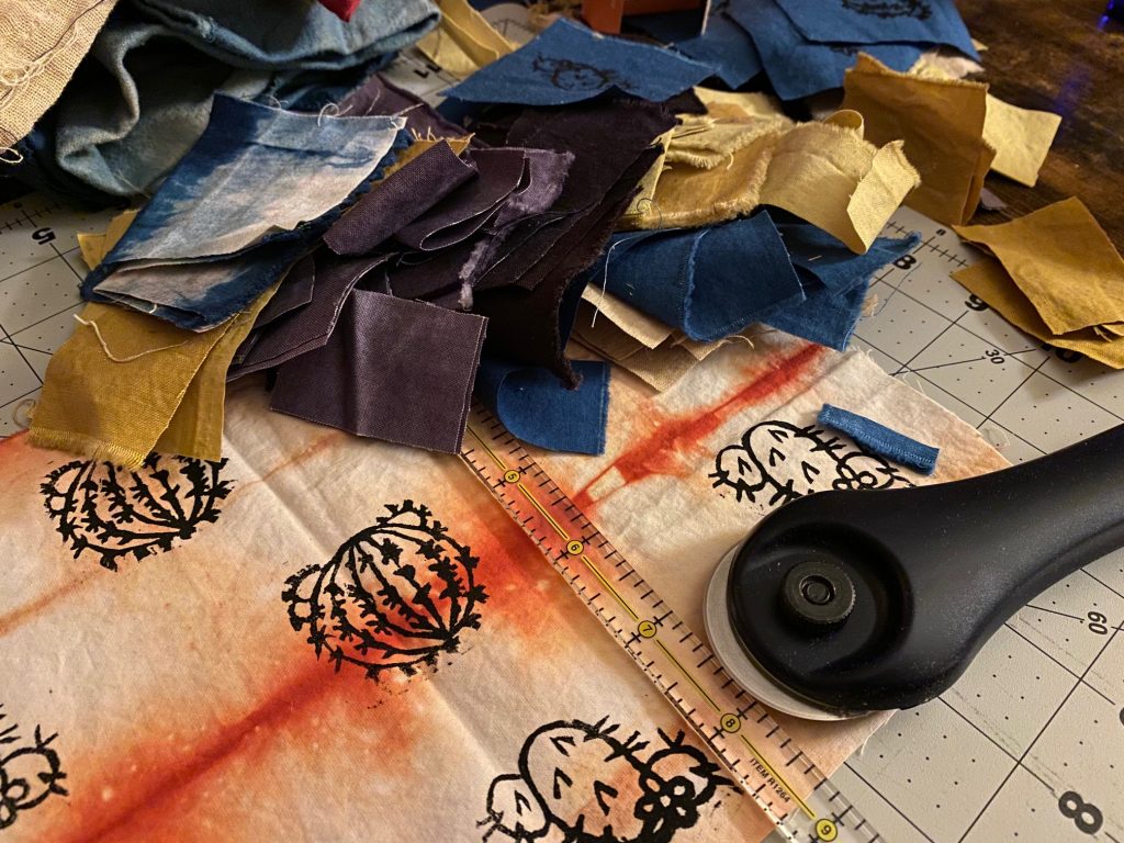 Image: A photo of scraps of fabric and measuring tools used by Sangi Ravichandran. Photo courtesy of the artist.