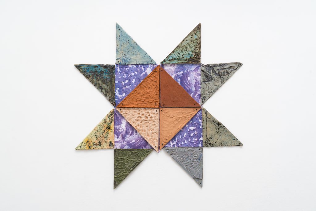 Image: Path Star by E. Saffronia Downing. Glazed earthenware, glass, and stones from Chicago, Baltimore, Steuben, Waterville. The stoneware is in the shape of an eight-point star. Photo by Robert Chase Heishman.
