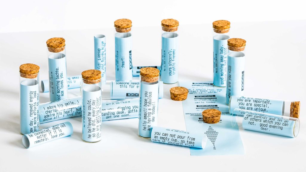 Image: Amay Kataria, Antidote, 2020. Glass vials with cork stoppers contain receipt slips with customized printed messages on them. Image courtesy of the artist.