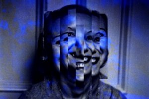 Image: A photo of Anna Kavan smiling in greyscale and blues, rectangular fractions of her face disjointed. Image by Ryan Edmund Thiel.