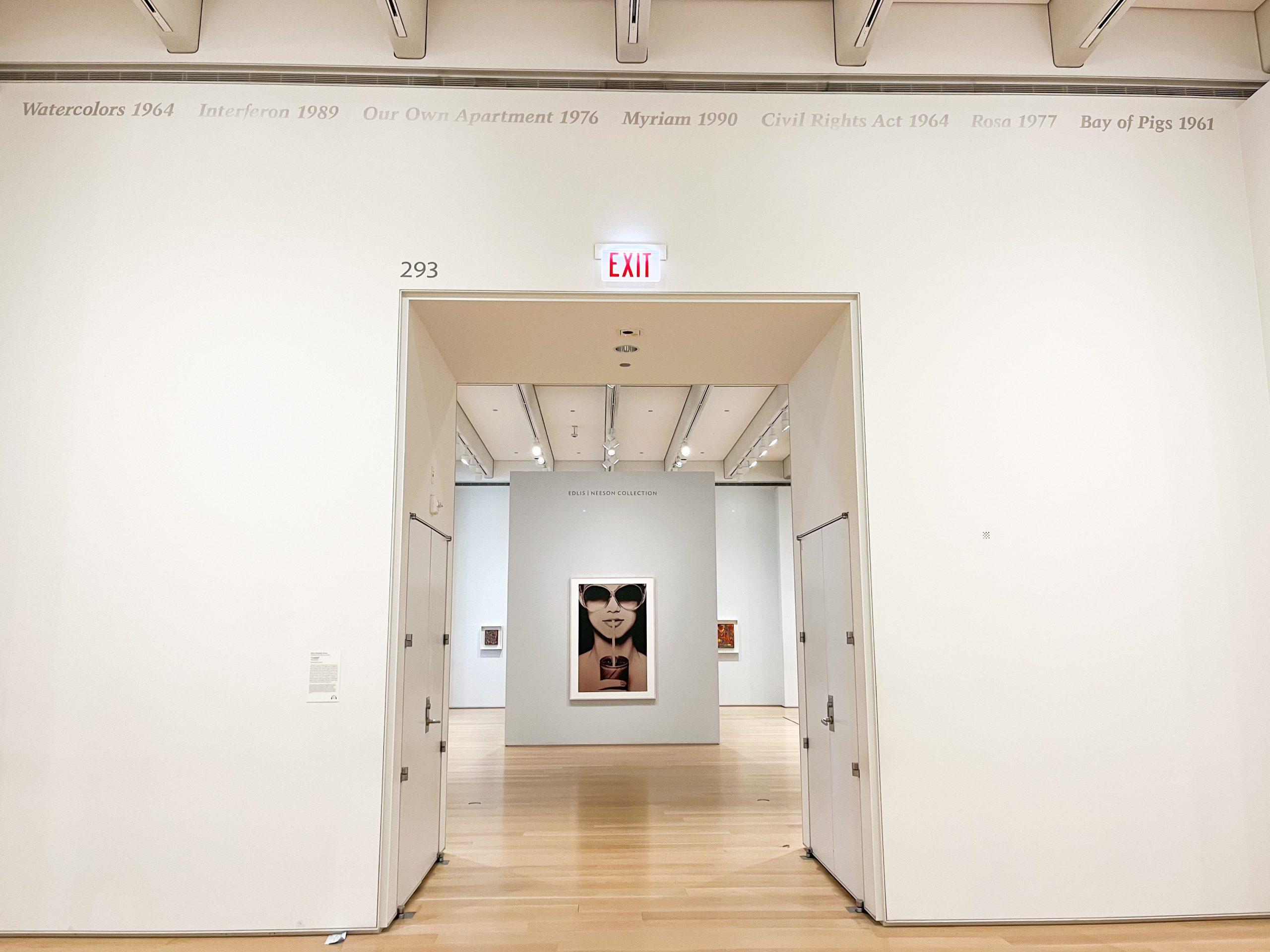 View of Gallery 293 at the Art Institute of Chicago with a portion of “Untitled” 1989 by Felix Gonzalez-Torres visible at the top of the gallery. Image courtesy of Onyx Montes.