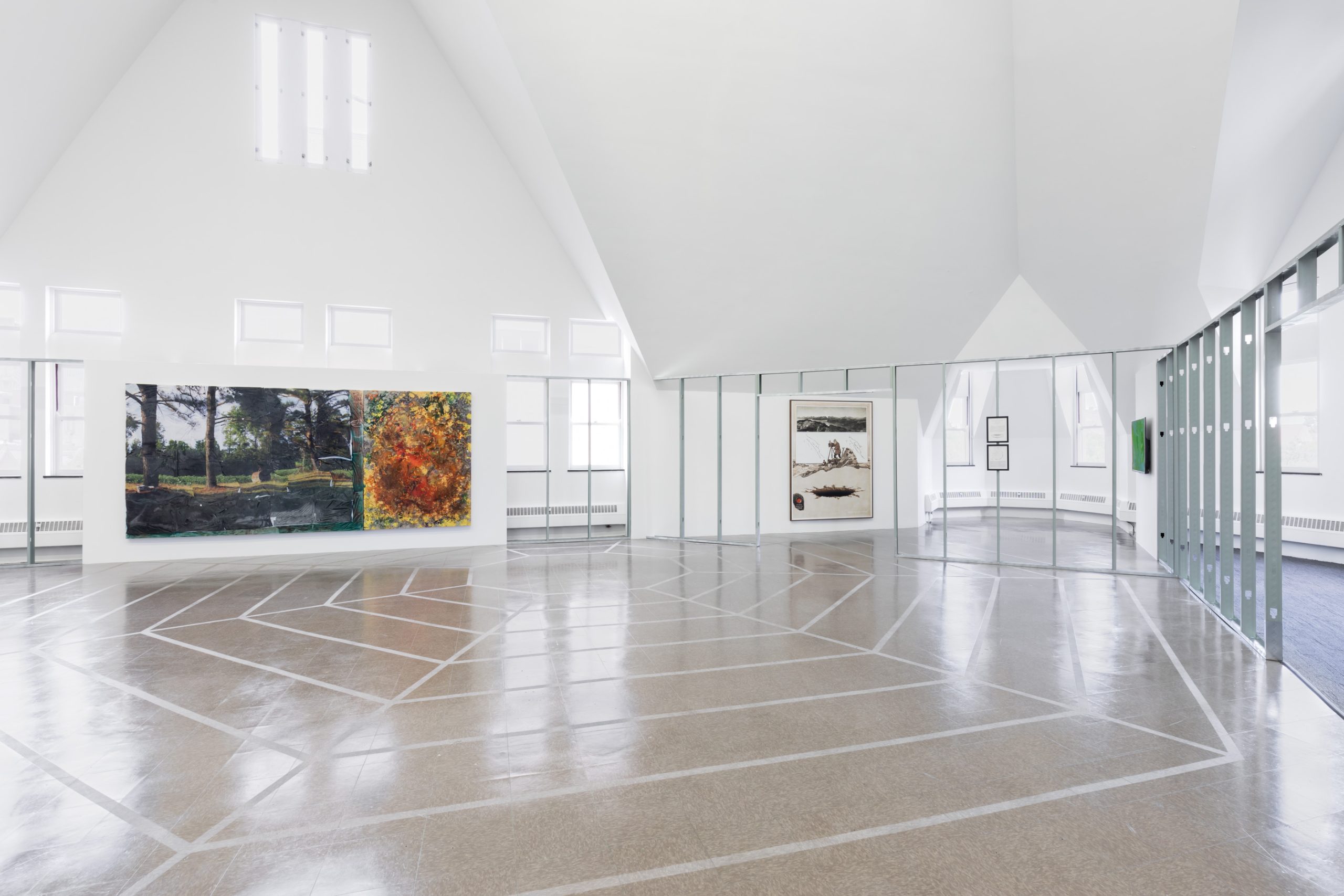 Image: Fear of Property, installation view, the Renaissance Society. Painting of a woodland scene on a floating wall with a reverberating octagonal design on the floor of the gallery. Courtesy of the Renaissance Society at the University of Chicago. Photograph by Useful Art Services.