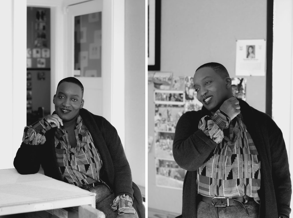 Image: Two black-and-white portraits of Wisdom Baty, the founder and creative director of Wild Yams: Black Mothers Artist Residency. In the left image, she sits at a worktable and looks at the camera, with her right hand gently resting under her chin. In the right image, she is looking off-camera as she stands before a grouping of prints tacked to the wall. Photographed at THE cre.æ.tive ROOM in South Shore. Photos by zakkiyyah najeebah dumas o’neal.