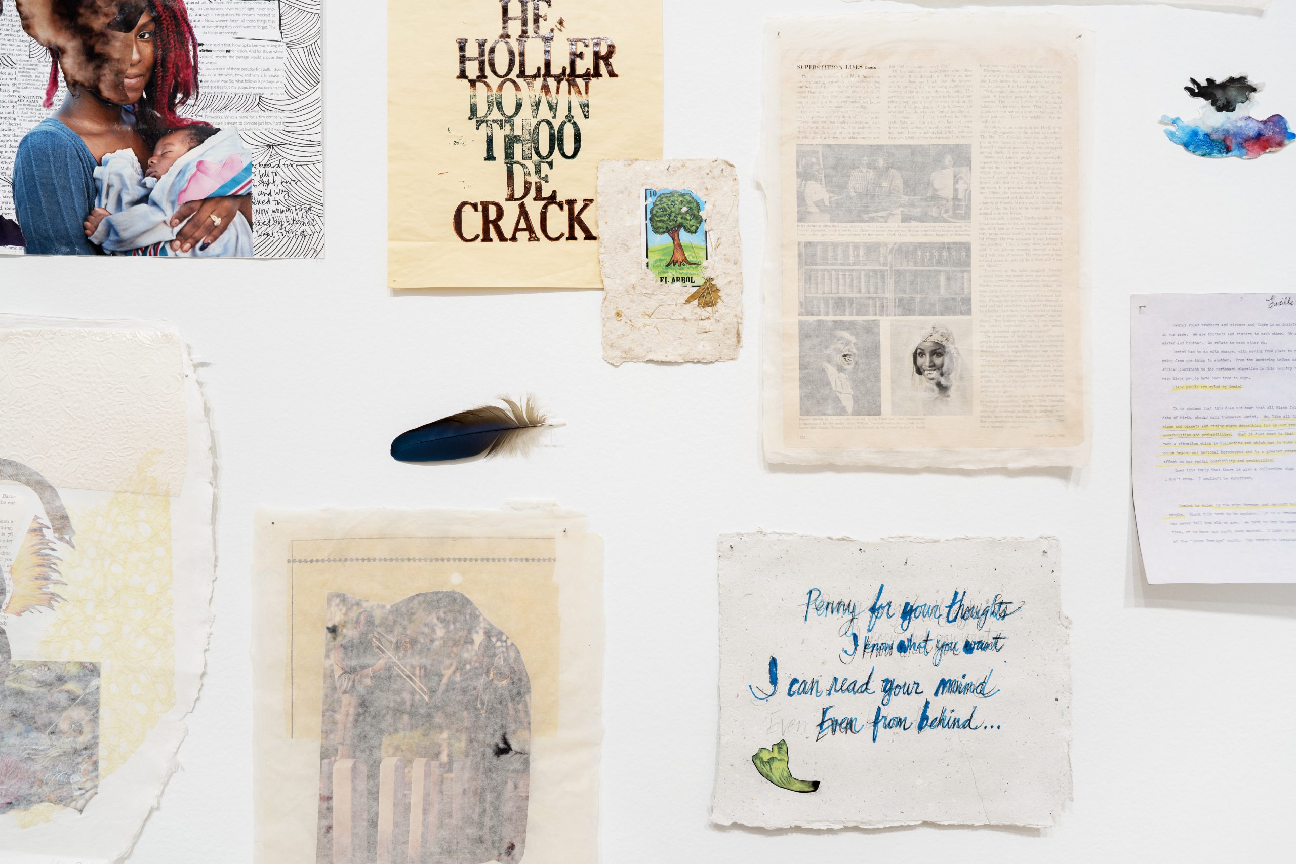 Image: Installation View, Krista Franklin, …to take root among the stars (detail), 2016-2022. A collage of various textured and aged papers with text, a paper with a Black woman half blotted out in the upper left corner, a blue-black feather in the middle, and a blot of black, red, and blue ink in the right corner. Photo by Dabin Ahn. Courtesy of DePaul Art Museum