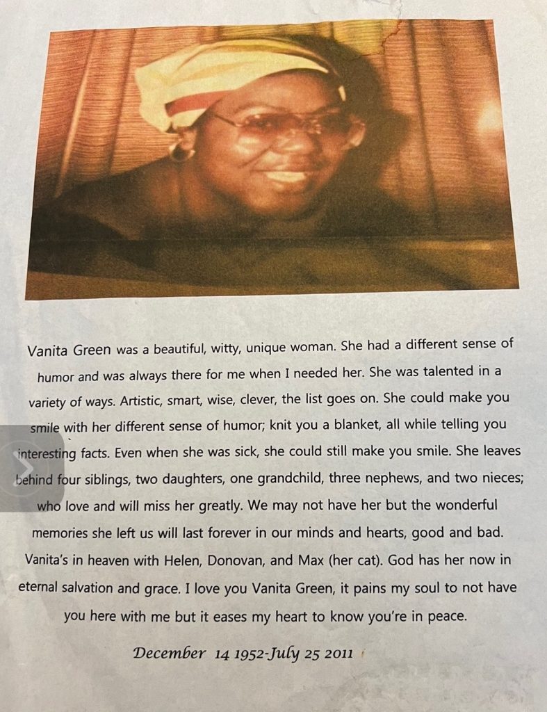 Image: Vanita's obituary on a piece of paper. On the top third of the paper is a photo of Vanita smiling. On the bottom half is a paragraph of text describing Vanita's goodness. Image courtesy of the Green family.