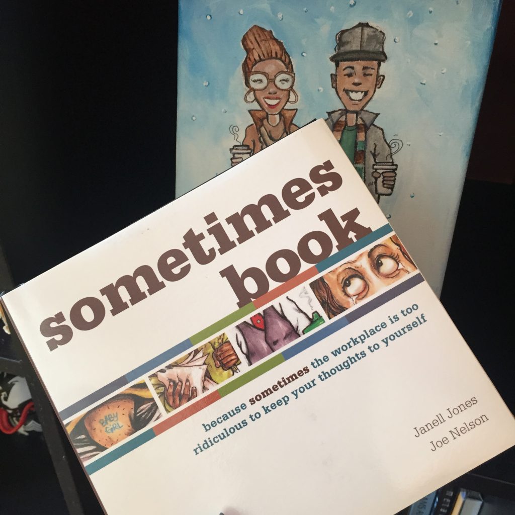 Image: A photo of the cover of "Sometimes Book," seen in front of a small painted portrait of Janell and Joe. Photo courtesy of the artists.