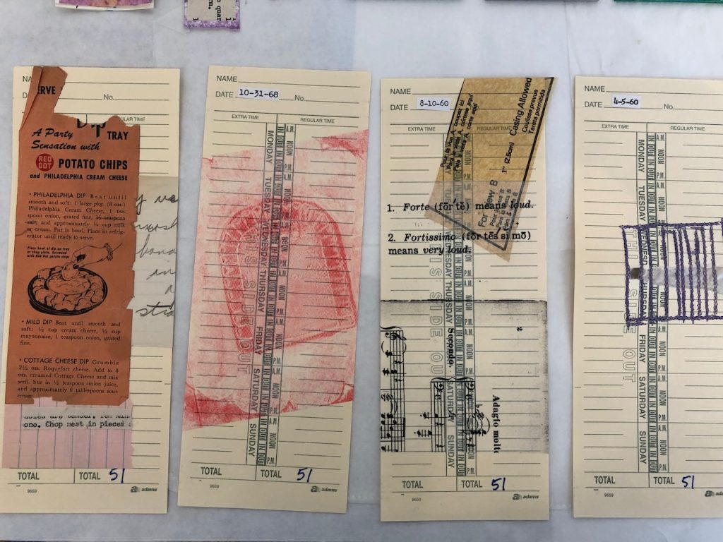 Image: Time Cards for Mothers, 2021. L to R: Mending, Nurturing, Childcare. Collage on timecards, with paper, fabric, and machine stitching. Three-time cards are on a table. The first is the one that’s torn and sewn back together, described above. The next two have stiffened fabric with printed hexagons, each hexagon having a design inside of it. The fabric is for children and looks vintage, but may be a reproduction.  The hexagons extend beyond the edges of the timecard. For the total number of hours, each time card has “51.” Courtesy of the artist.