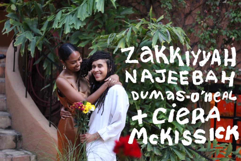 Image: zakkiyyah and Cierra stand together outdoors in front of a large plant and a brownstone. Their names can be seen on the right hand side of the photo. Photo courtesy of the artists.