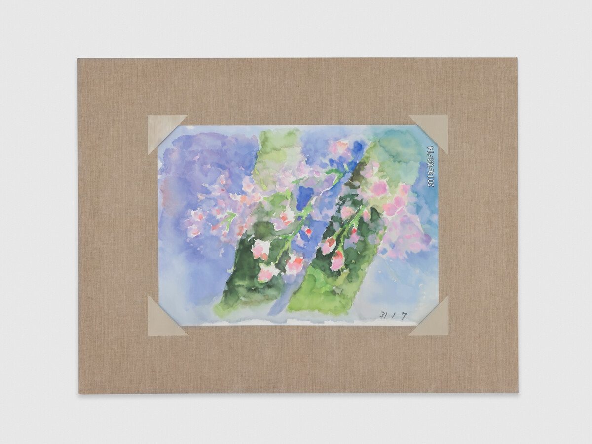 A watercolor painting of pink weeping cherry blossoms draped in front of two green trunks and a pale blue background is surrounded by raw linen.