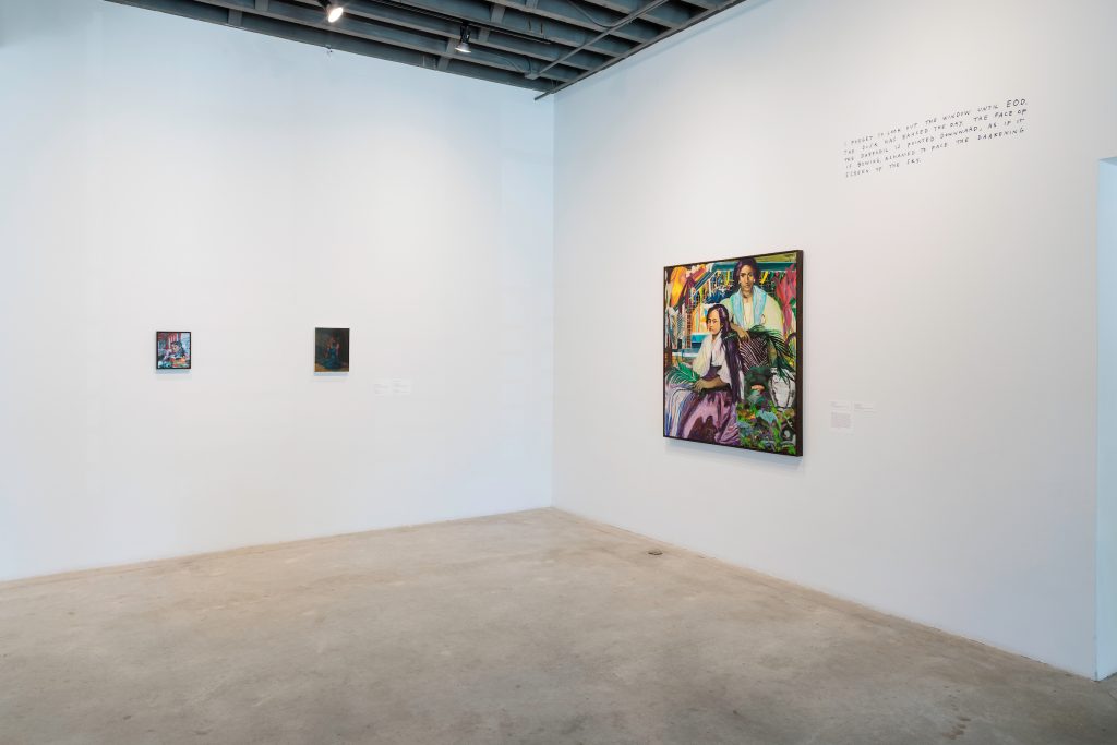 Image: Installation photo of Presence in the Pause: Interiority and its Radical Immanence. Maia Cruz Palileo's "All the Crossed Out" and Danielle Mckinney's "Twilight" hang on the left. Maia Cruz Palileo's "Magic Fire" is displayed on the right with a white background. Image courtesy of Bemis Center For Contemporary Arts.