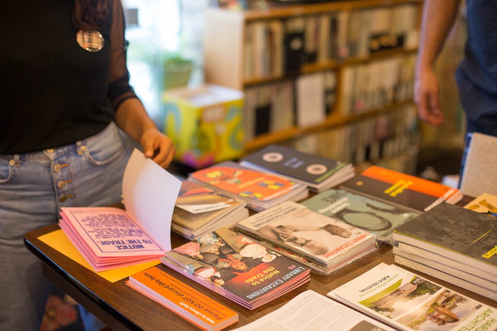 Image: A view of the zines in Oscar Arriola’s zineMERCADO at the 2018 Chicago Archives + Artists Festival. Photo by Ireashia Bennett.