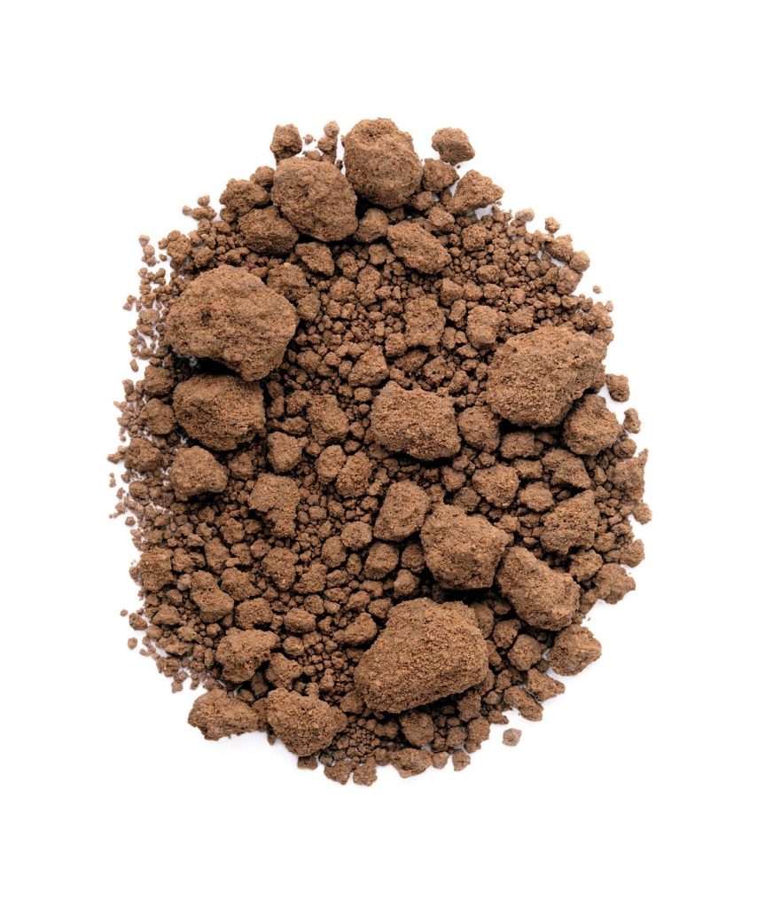 Image: Liza Nguyen, Surface, Cu Chi, 2004, digital inkjet print. Collection of the Museum of Contemporary Photography. Clumps of a milk chocolate brown soil of varying sizes, arranged in the center of the image in an egg shape. Image courtesy of MoCP.