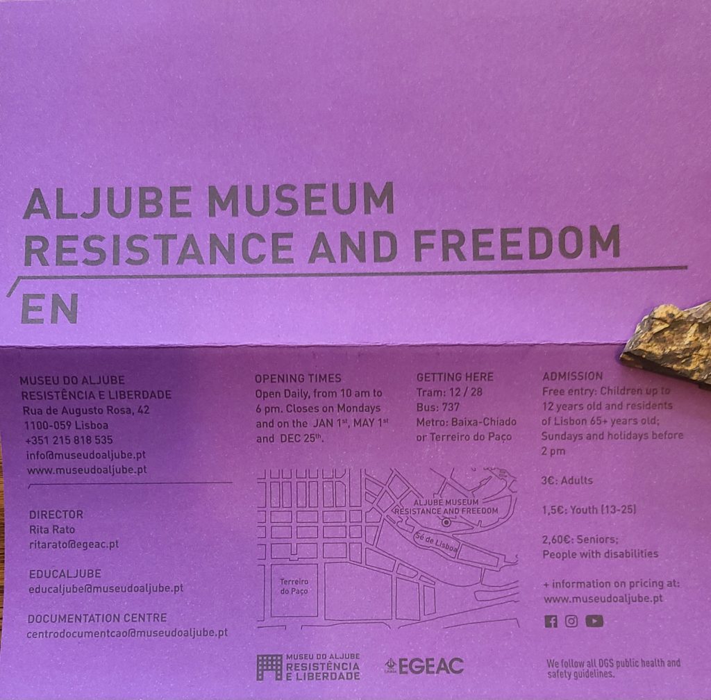 Image: Aljube Museum Resistance and Freedom informational pamphlet cover with logistical info. The text is black and the paper is purple. Image by Chierophant.