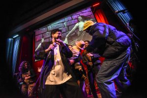 Image: Foto shows Lester Rey closing the night with an electrifying bomba performance alongside Africaribe, joined by producer/DJ/songwriter Sundiata, at Old Town School of Folk Music. Digital foto by Carolina Sánchez.