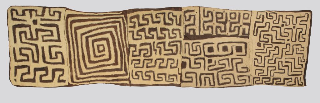 Image:  Kuba Peoples, Shoowa Group, Democratic Republic of Congo, Woman’s Skirt, mid 20th century, Raffia palm fiber with applique designs. Image courtesy of Toledo Museum of Art.