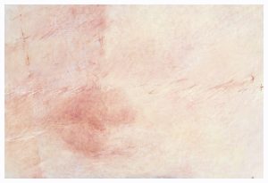 Exhibition photo of Eros II, 2024, by Yifan Li. Work is a 36 x 24 inches sized oil and pastel painting. In the left third of the work, soft masses and shapes of pink and red arise. The middle and right thirds of the work are blue and yellow colorations. Divided between the bottom left and middle thirds is a red mass that seems to push out from a series of intersecting white and red markations. It seems to form a faint pucker, the shape of lips. White and red marks form a sort of criss cross pattern, reminiscent of a fence. Photo courtesy of Goldfinch Gallery.