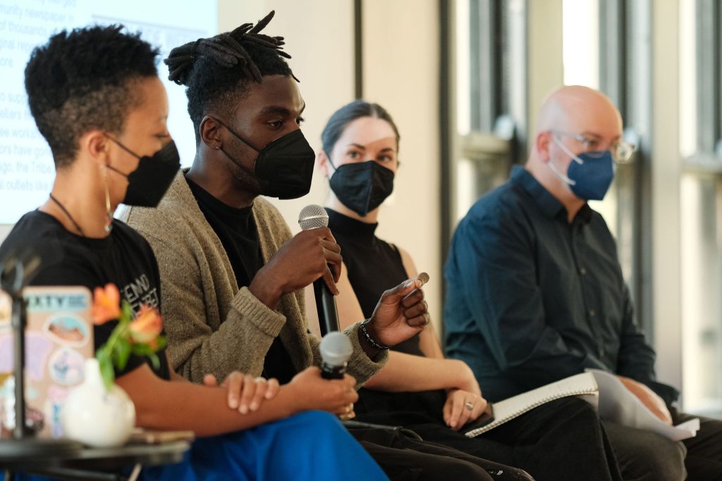 Image: Malik Jackson, executive director of South Side Weekly, speaks on a panel about non-traditional funding models for publishers. Image made by Seed Lynn (@seedlynn).