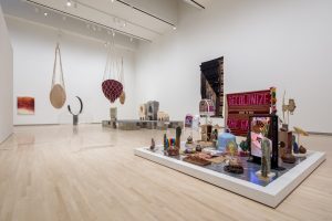 Image: Installation view of Seeds: Containers of a World to Come at the Kemper Art Museum, Washington University in St. Louis (February 21–July 28, 2025). Photo by Joshua White / JWPictures.com. In the foreground is Juan William Chávez's installation, Seed Blanket (Decolonize the Garden: From Seeds to Bees).