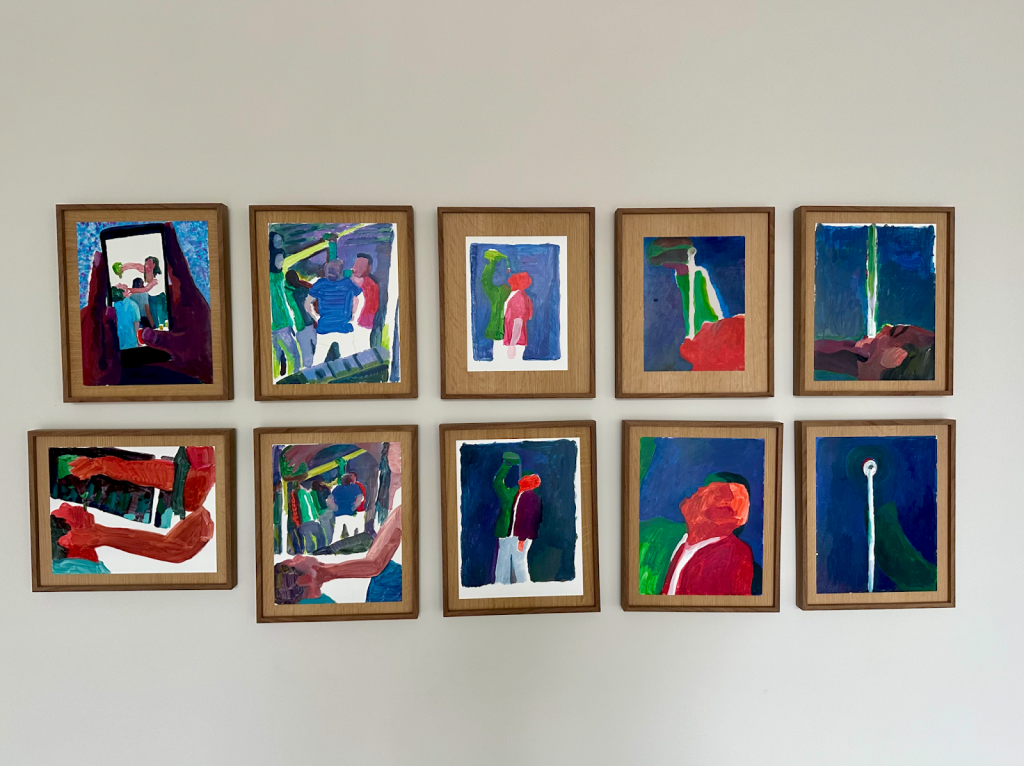 Image: A series of ten acrylic drawings on yupo paper framed and displayed on a wall. Each painting features abstract human figures depicted in various poses and interactions, utilizing a vibrant color palette that includes shades of blue, red, yellow, and touches of green. Image courtesy of the artist.