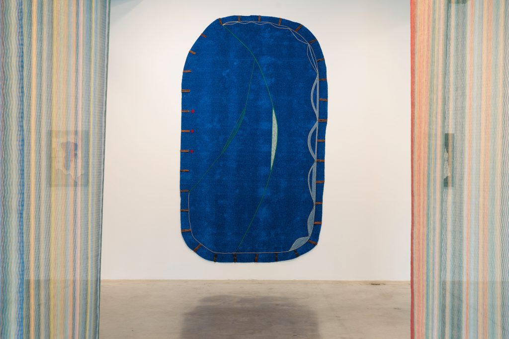 Image: Buffalo Bird Woman, 2024, Willow, buckskin, yarn, cottonwood bark on astroturf. Courtesy of Broadway Gallery, LLC.  Image courtesy Bemis Center for Contemporary Arts. Photo by Colin Conces. 