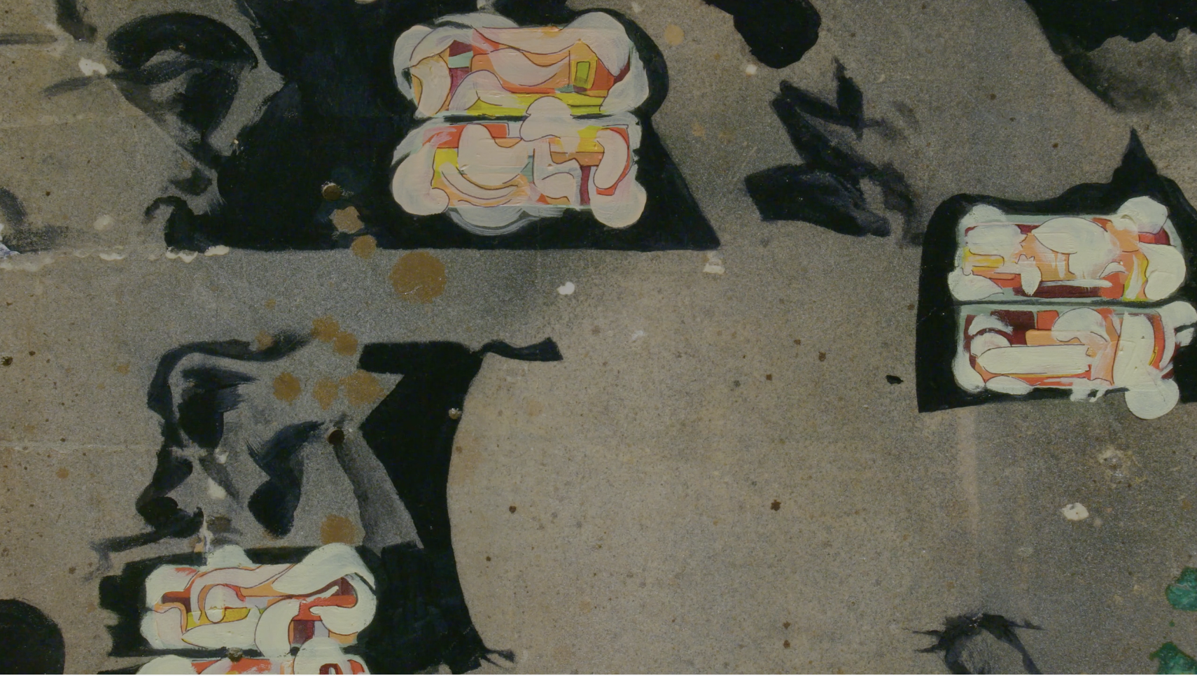 Detail of a mixed-media artwork by Jess Zottola. Abstract white, orange, and yellow shapes and bold black shapes dot a grey background. Courtesy of Glass Breakfast.