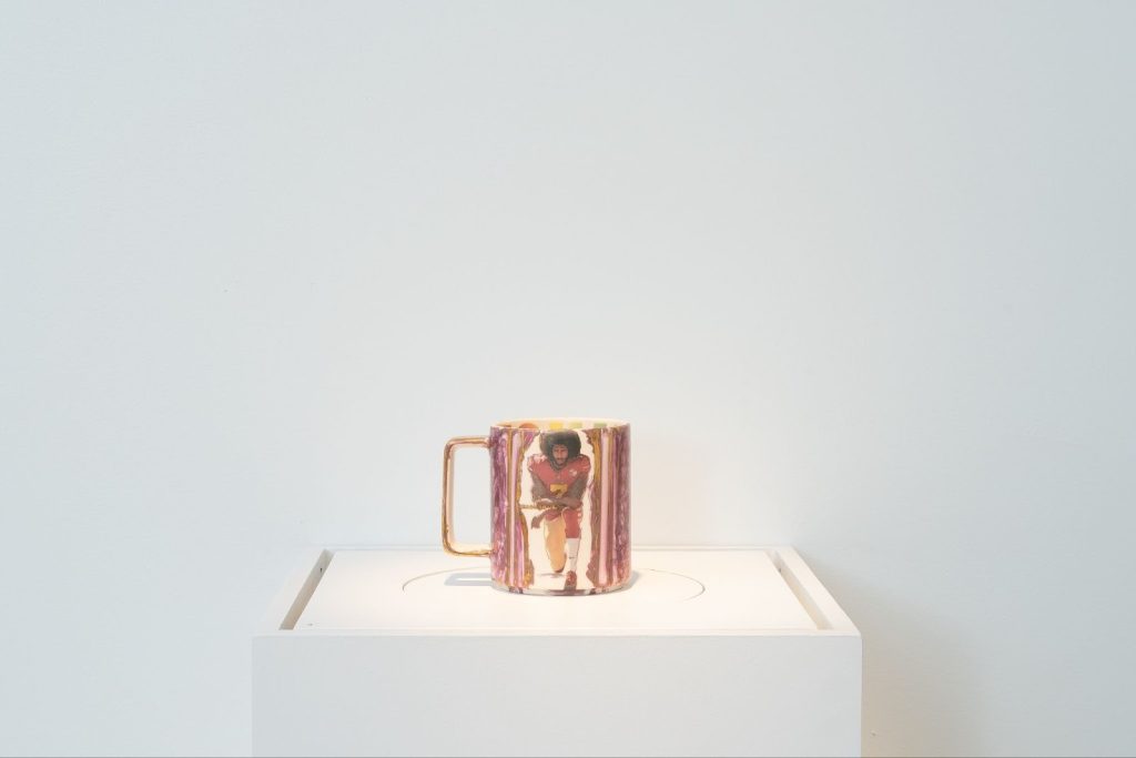 Michelle Erickson, Remember, 2021, commercial mug with artist's ceramic transfer designs and gold and pink luster enamel. Photo: Daniel McCullough.