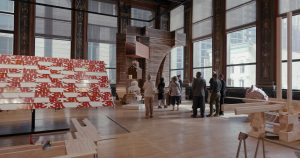 Gallery-goers look around the Chicago Cultural Center's 4th floor gallery space where pieces are dispersed across it's floor. A group of gallery-goers view a piece in the corner of the gallery which features a thick wooden stand which holds up a model of two house. One of the houses is lit from within. On their right the piece Air Vapor Barrier Oscar Zamora and Michael Koliner, which features the brand name, 3M, on each line of a wood roof. Image courtesy of the Chicago Architectural Biennial.