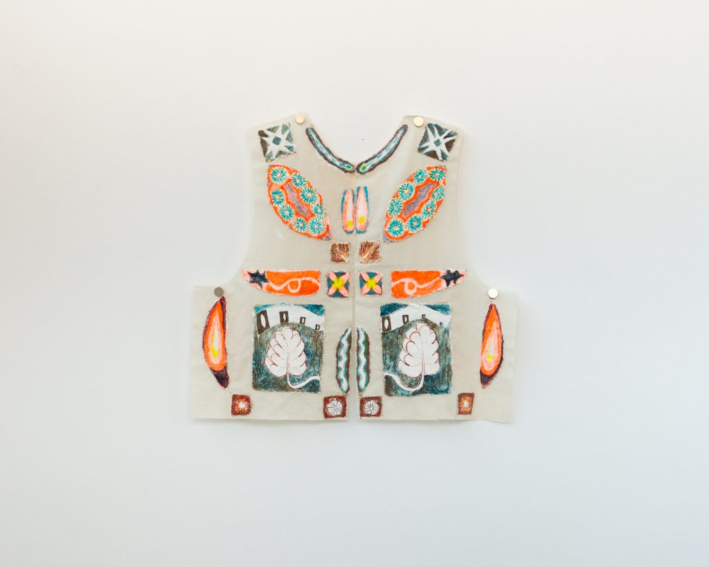 Sending a Picture (garment front), 2026. A two-dimensional garment pattern made from fresco is hung from the wall and decorated with various fresco tiles with abstract images and floral designs.