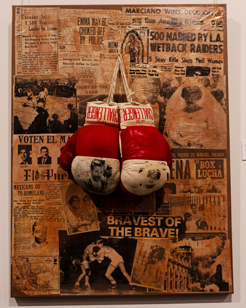 Installation image of Luchadores (Mis Abuelos), 2025 by Johnny Willems. Screenprint on boxing gloves on risographed newsprint paper. Photo courtesy of the artist.