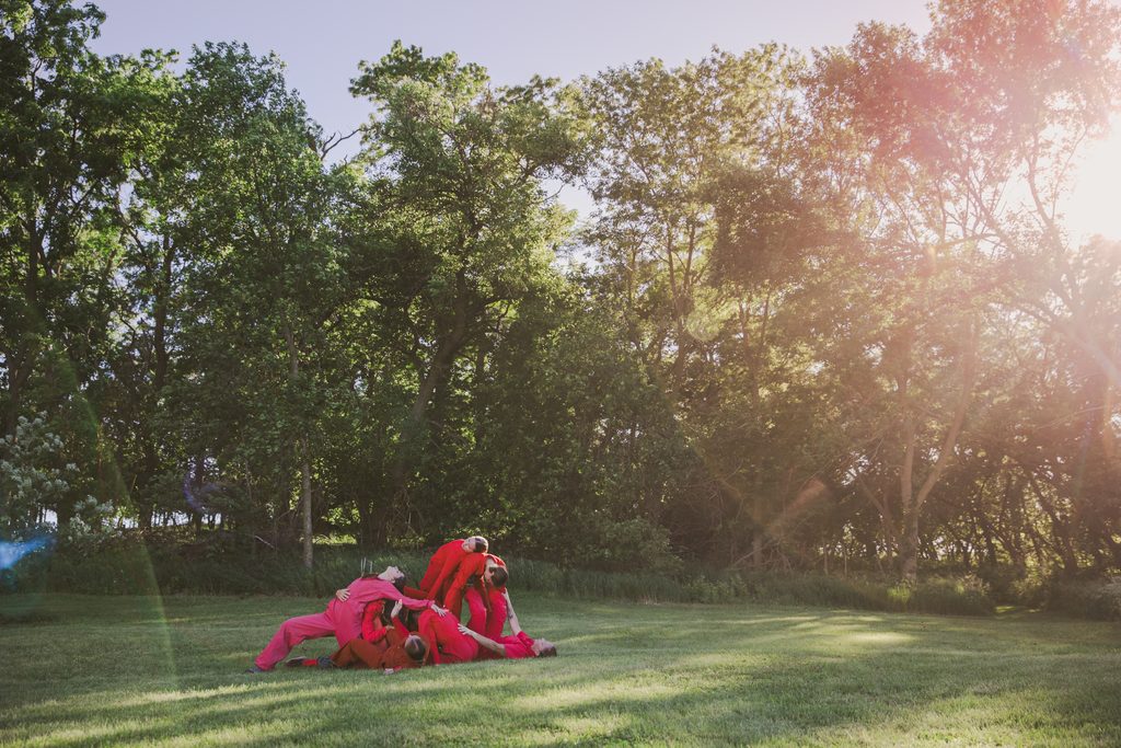 Image: A shot from "Big Bluestem" choreographed by Kat Fackler with music performed by harpist, Elyse N. Jorgensen. Image by Ben Semisch.