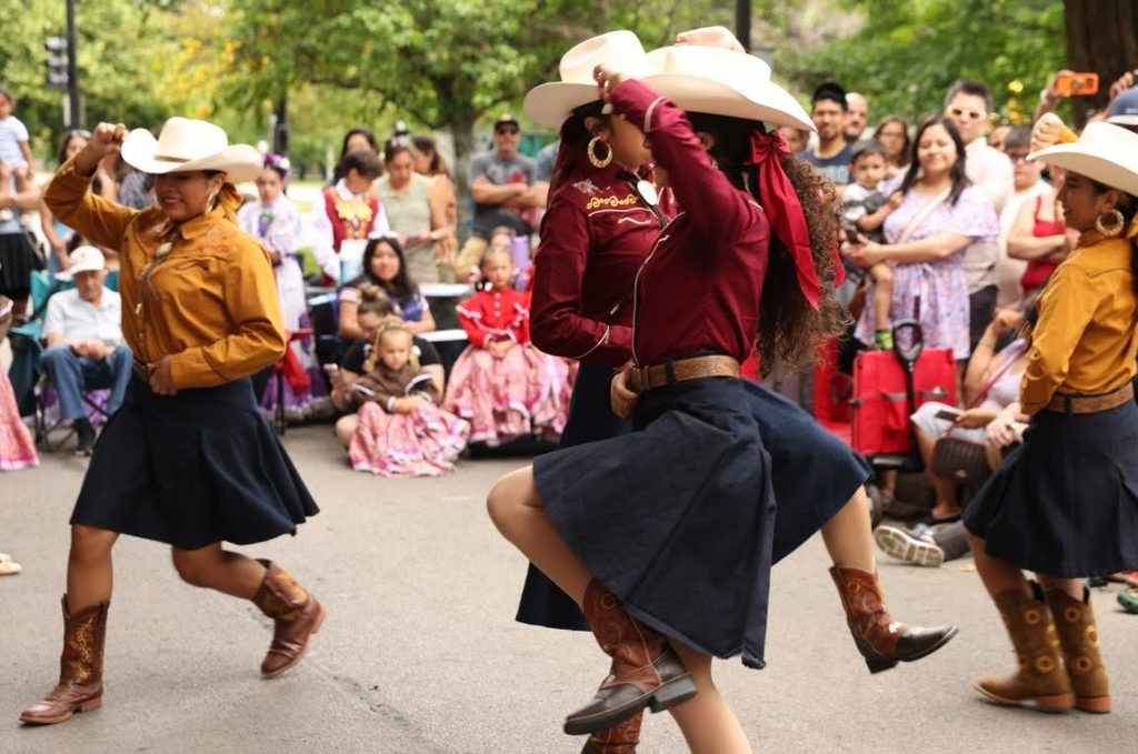 Ballet Folklórico de Chicago dancers at Calaveras block party. Photo by Felix Fregoso.
