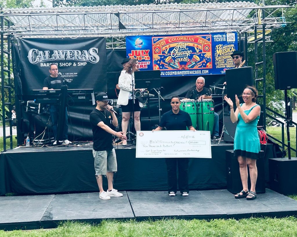Sepeda and Ald. Jesse Fuentes presenting a 10K check to Ballet Folklórico de Chicago at Calaveras 10th Year Anniversary Block Party. Photo by Basia Krupa.
