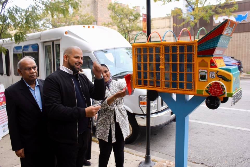 Urooj Shakeel with Alderman Vasquez at the ribbon cutting ceremony for Truck Art Meets Little Free Library at Devon Avenue and Clark Street. Photo by Hilesh Patel.